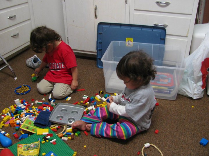 My nieces raiding Grandma's toy cabinet in October 2010